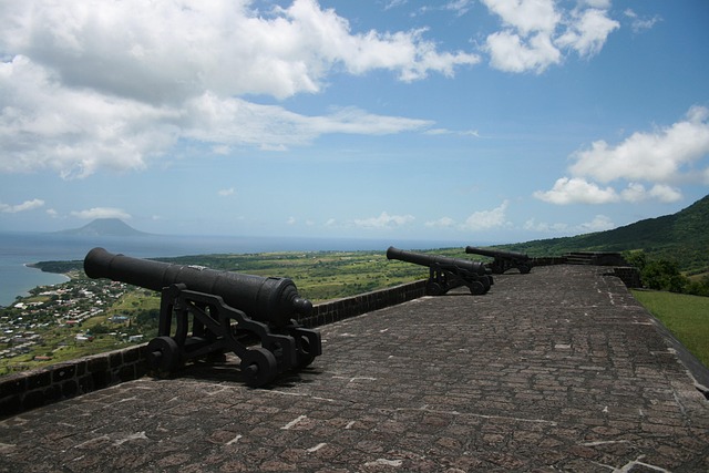 Old stone Caribbean fort on a cliff overlooking turquoise sea